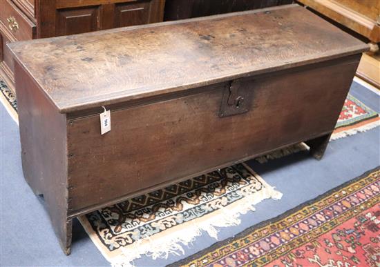 An 18th century oak six-plank coffer W.132cm